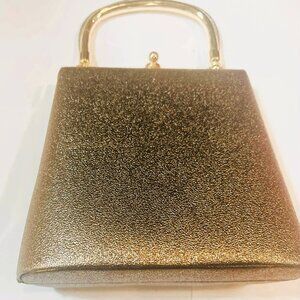 A rare minimalist luxury piece — genuine leather with a sleek gold frame for tim